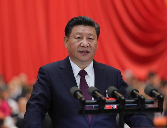 　10月18日，習(xí)近平在中國共產(chǎn)黨第十九次全國代表大會上作報告。新華社記者 鞠鵬 攝